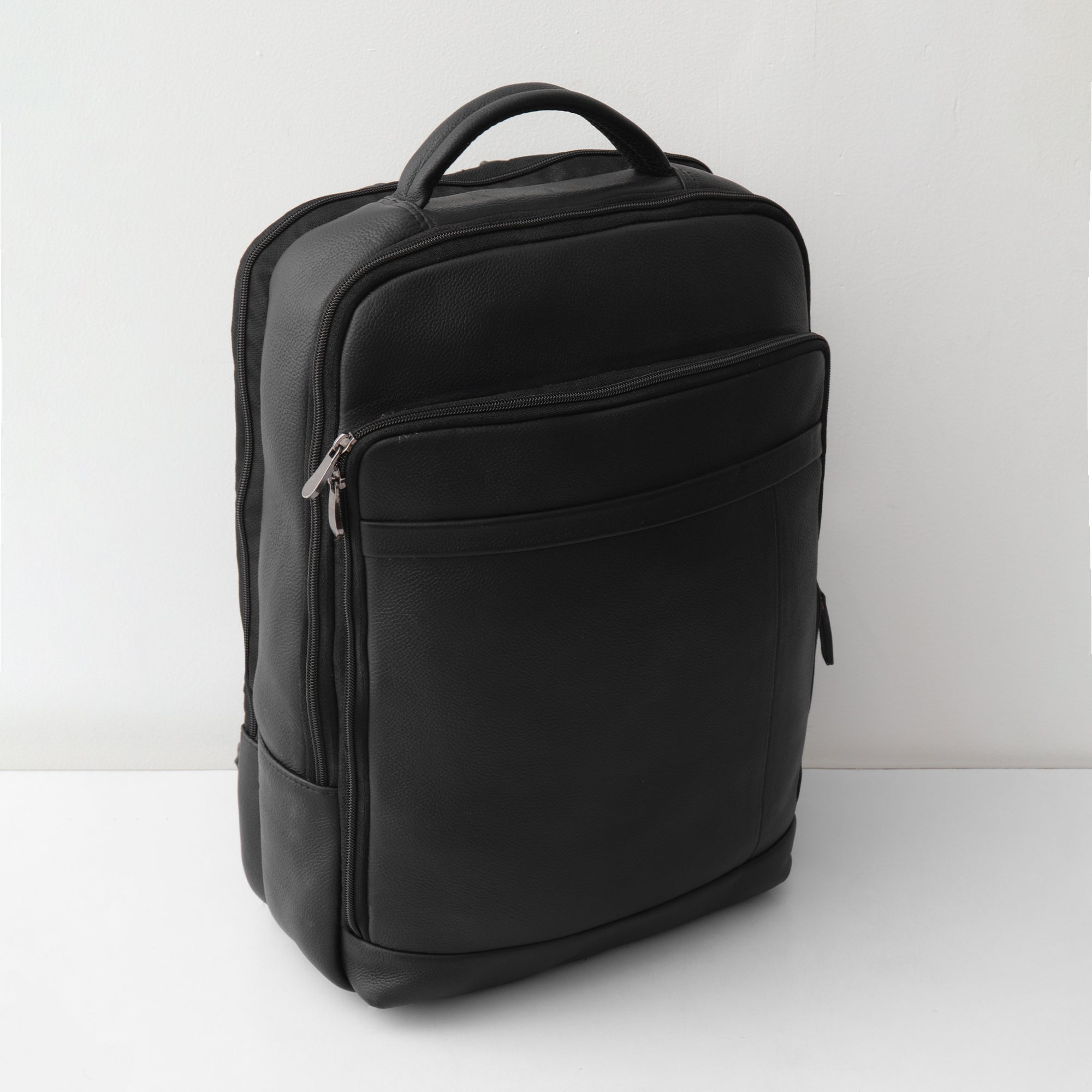 Executive Leather Backpack - Contemporary Design Meets Professional Functionality